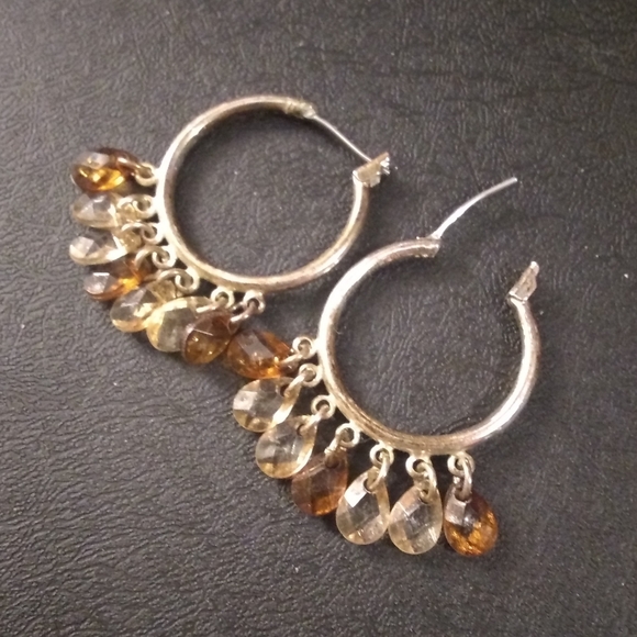 Hoop earrings with dangling brown and tan crystals